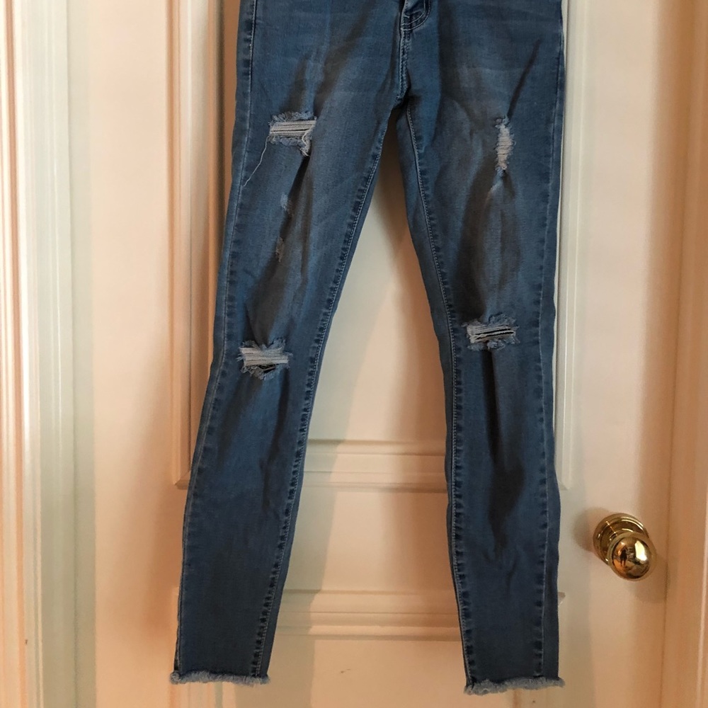 Ripped Light Blue Jeans